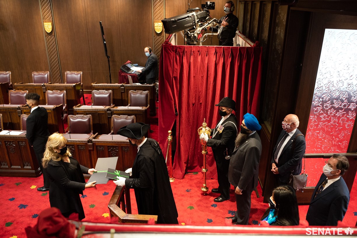 Normally, dozens of MPs crowd the Senate entrance to catch a glimpse of the ceremony. This time, only a handful of MPs took part. MPs are only allowed into the Chamber as far as the brass bar.