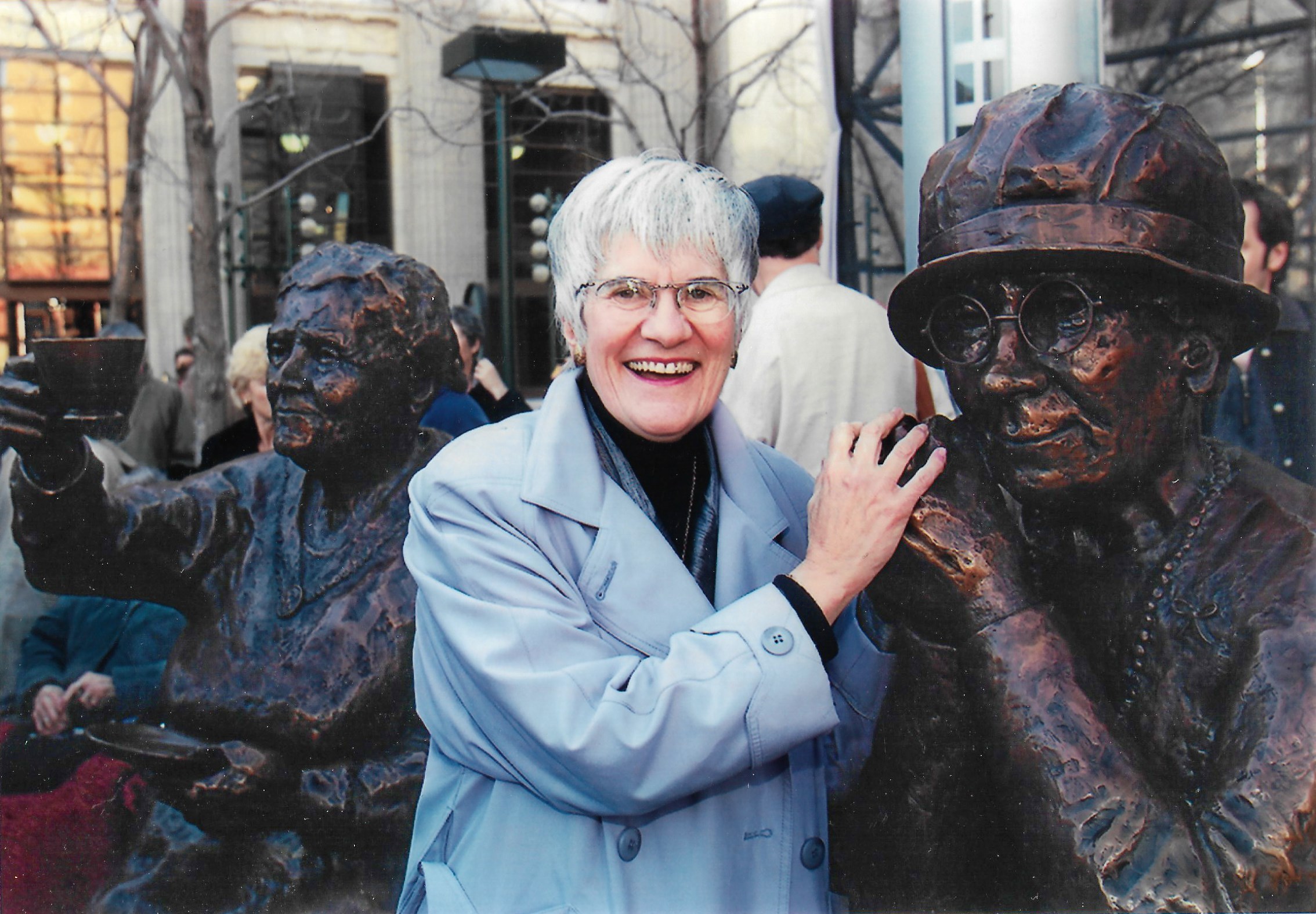 Mrs. Paterson stands with the Calgary version of the Famous Five monument in 1999. For the Ottawa version, unveiled a year later, Mrs. Paterson consulted extensively with Dominion Sculptor Eleanor Milne, head of Parliament’s sculpture program. “Eleanor was a grand lady,” Mrs. Paterson said. “She really inspired me.” (Photo credit: Barbara Paterson)