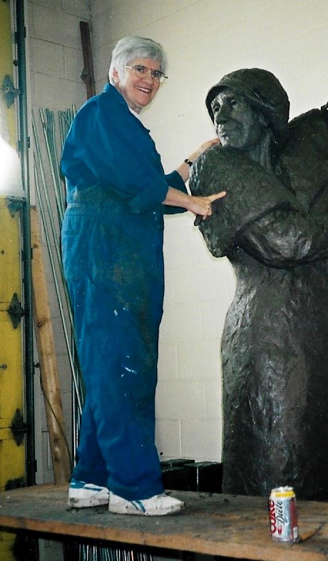 Mrs. Paterson works on the full-size wax-and-clay figure of Nellie McClung at Calgary’s Bronzart Casting in 1998. (Photo credit: Barbara Paterson)