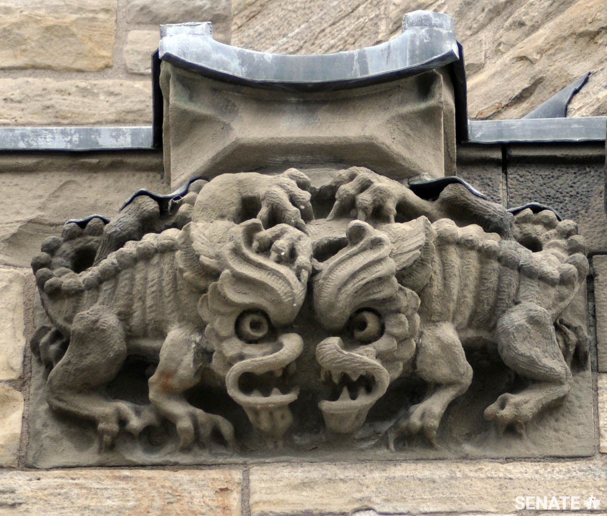 Head-butting dragons adorn the exterior of Centre Block.
