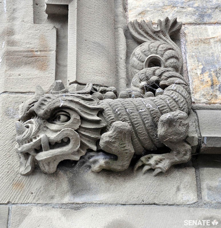 A grotesque in the form of a fish-tailed dragon lurks at the base of Centre Block’s Peace Tower.