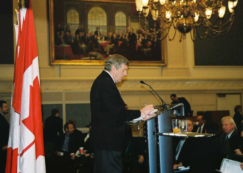 Senator Doyle chairs the Conservative caucus meeting during his time as a Member of Parliament.