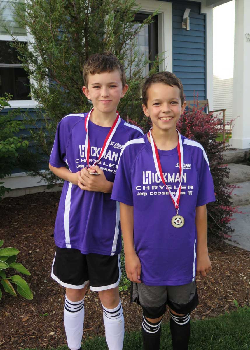 Senator Doyle plans to spend more time with his grandchildren Thomas, left, and Will during his retirement.