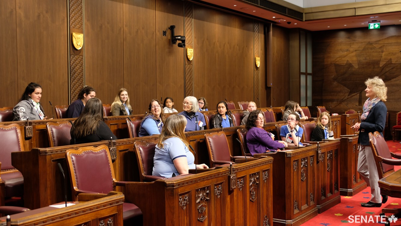 Senator Pat Duncan meets with a group of Girl Guides in the Senate Chamber on May 1, 2019. Senator Duncan spoke about the role of the Senate and her own journey to becoming a senator as part of a SENgage youth-outreach event.