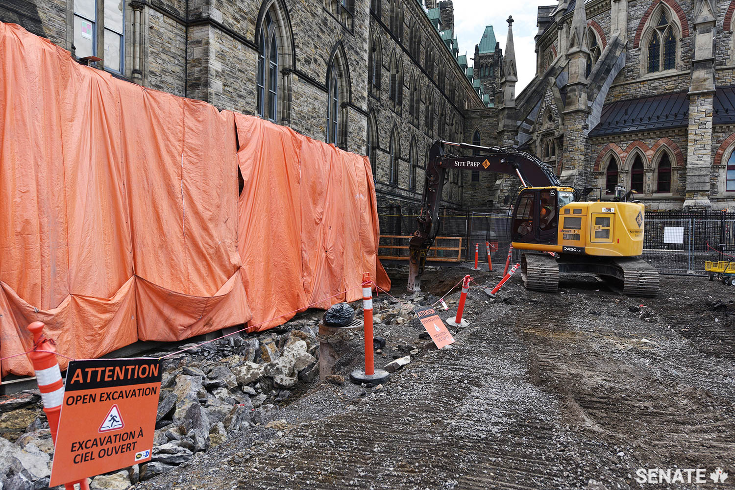 Foundation work takes place along Centre Block’s north face, next to the Library of Parliament.