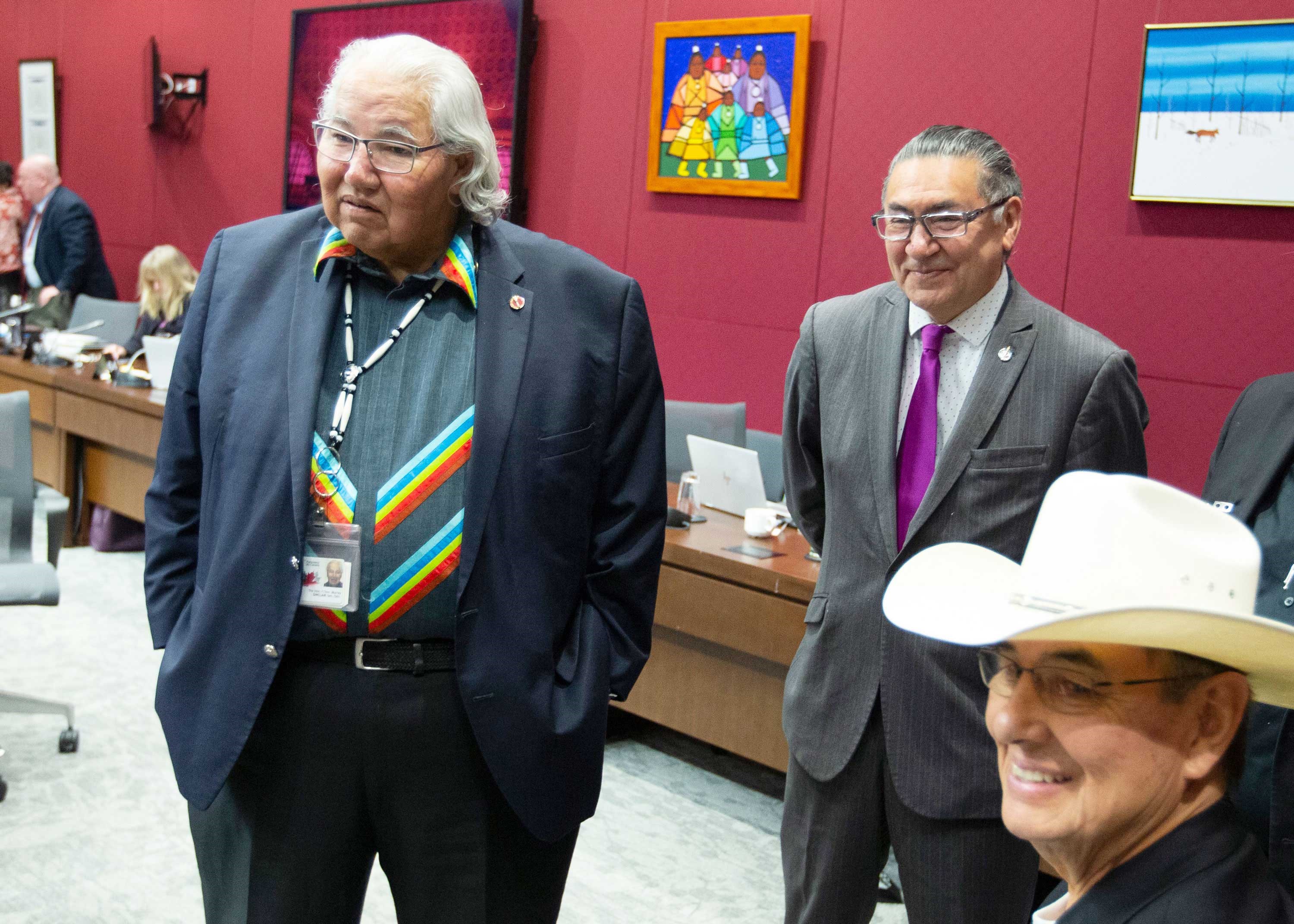 Senator Murray Sinclair, left, and MP Romeo Saganash, centre, get ready to appear before the Senate Committee on Aboriginal Peoples in Ottawa on May 28, 2019. (Photo credit: Fred Chartrand/The Canadian Press)