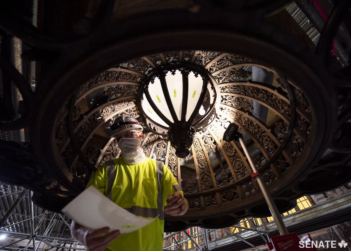Conservators estimate the chandelier’s dome alone weighs 365 kilograms, while the scalloped ring — from which the lanterns hang — weighs slightly more. Workers on site followed all safety and public health rules that were in place at the time of the chandeliers’ removal.