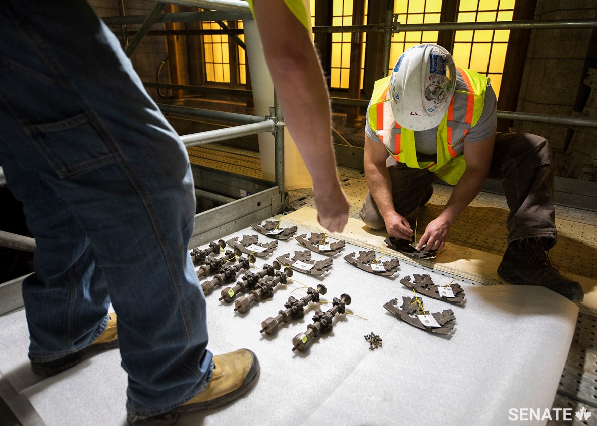 Workers carefully document smaller components of the Senate chandeliers, taking note of any number-and-letter combinations found stamped on pieces and the parts to which they fasten. The days-long dismantling process is like a 3-D jigsaw puzzle: challenging, but “fun,” according to Mr. Nelson.