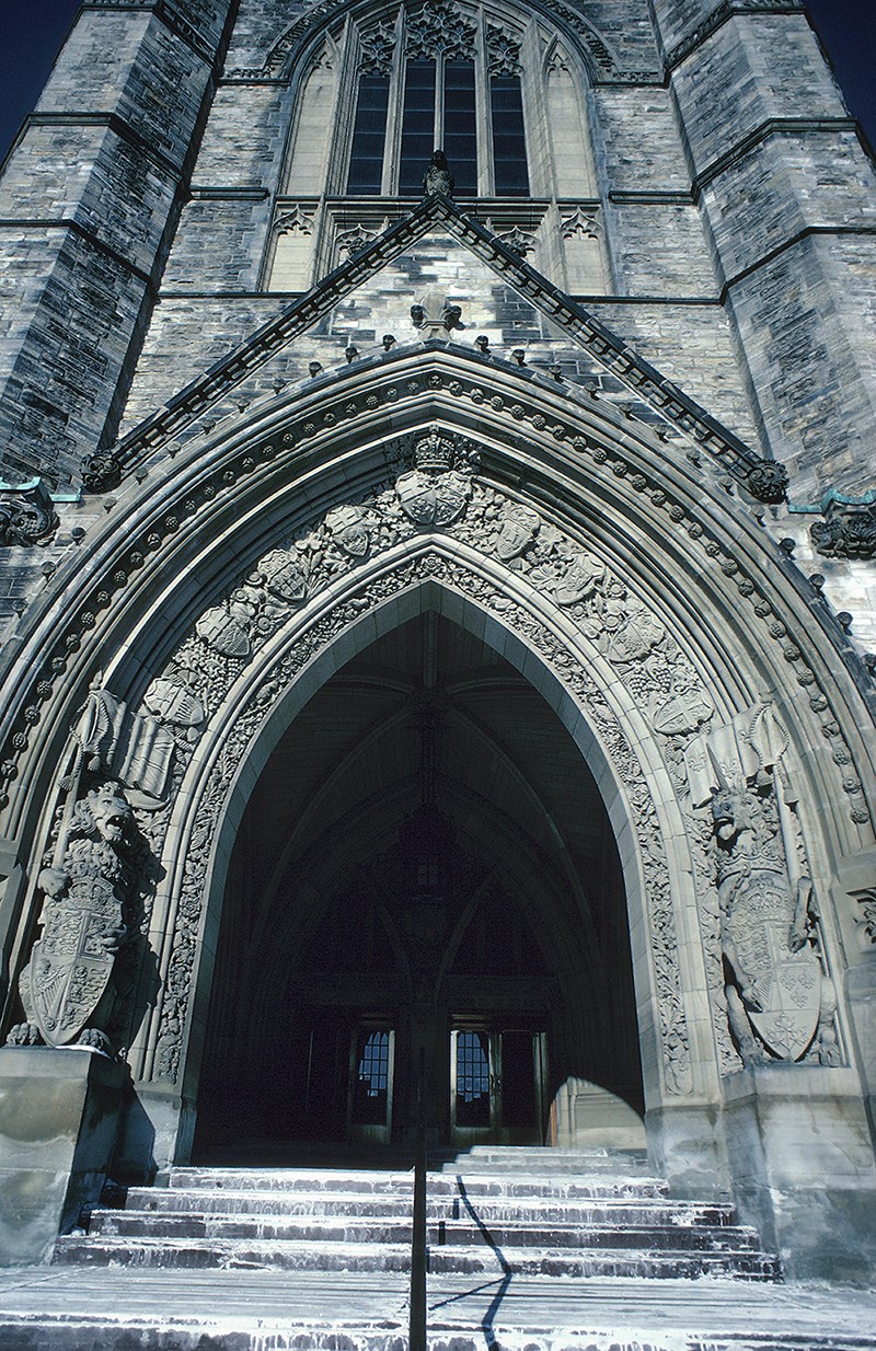 Between 1936 and 1940, Cleóphas Soucy and his assistant, Coeur de Lion McCarthy, carved the lion and unicorn statues flanking Centre Block’s entrance under the Peace Tower, as well as the provincial coats of arms that form the surround. (Photo credit: Getty Images)