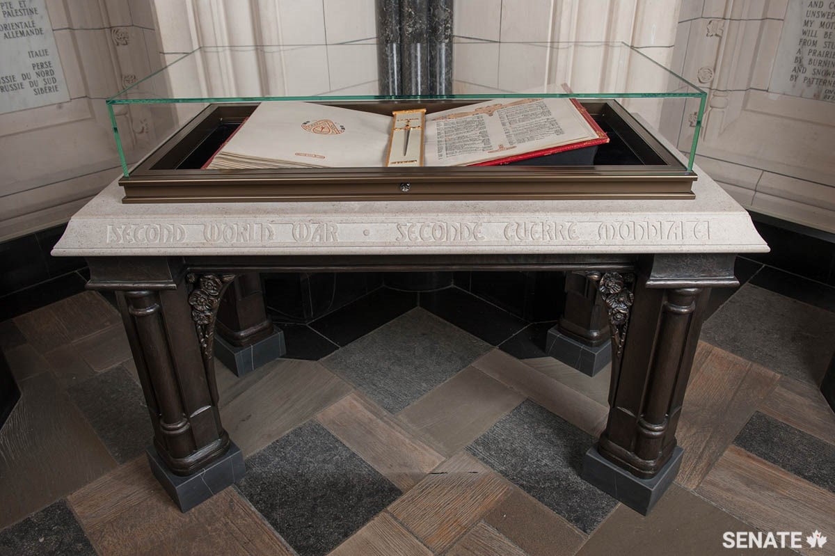 Current Dominion Sculptor Phil White designed seven new altars in stone and bronze for the Books of Remembrance in the Peace Tower’s Memorial Chamber. The book on the altar pictured here holds the names of Canadians who fought and died during the Second World War.