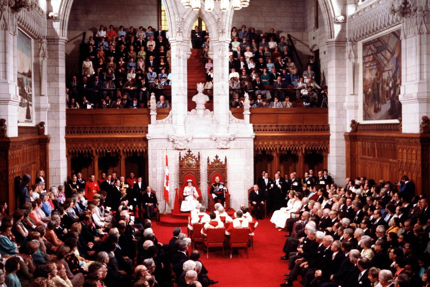 Prince Philip accompanies Queen Elizabeth as she reads the Speech from the Throne in the Senate Chamber on October 18, 1977, officially opening the third session of Canada’s 30th Parliament. (Photo credit: The Canadian Press)