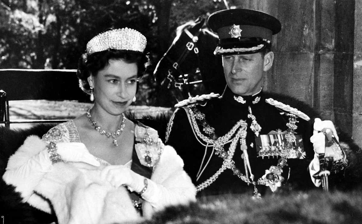 Queen Elizabeth and Prince Philip ride to Parliament Hill in October 1957 for the opening of the 23rd Parliament during the royal couple’s first tour of Canada following the Queen’s coronation in 1953. (Photo credit: The Canadian Press)
