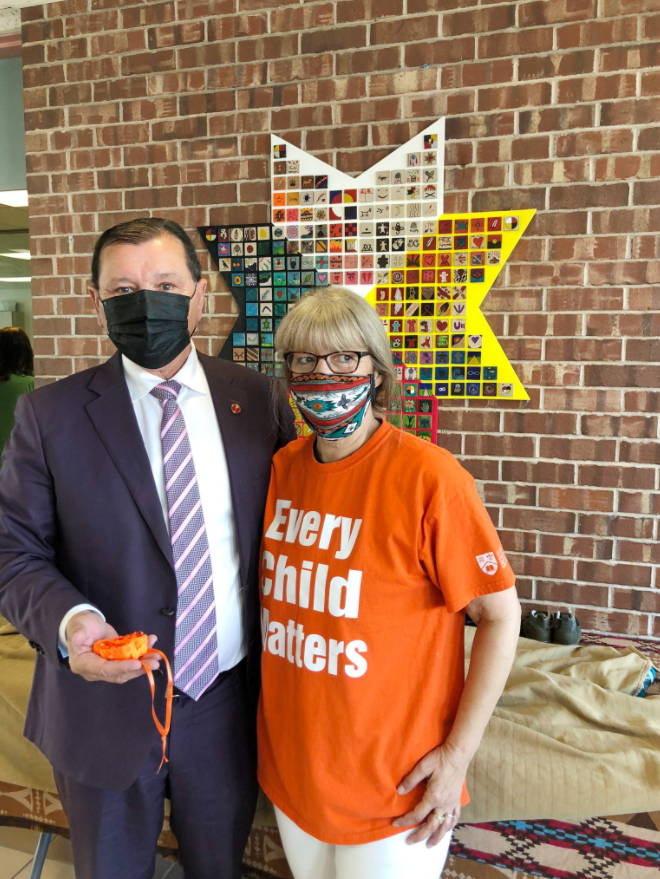 Senator Brian Francis participates in the unveiling of a commemorative plaque at Colonel Gray High School in Charlottetown, Prince Edward Island