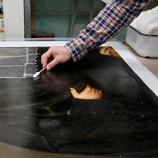 Conservators uncover hidden details while bringing a collection of Senate portraits back to life 