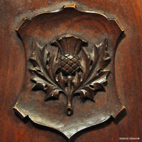 A Scottish thistle is another recurring emblem.