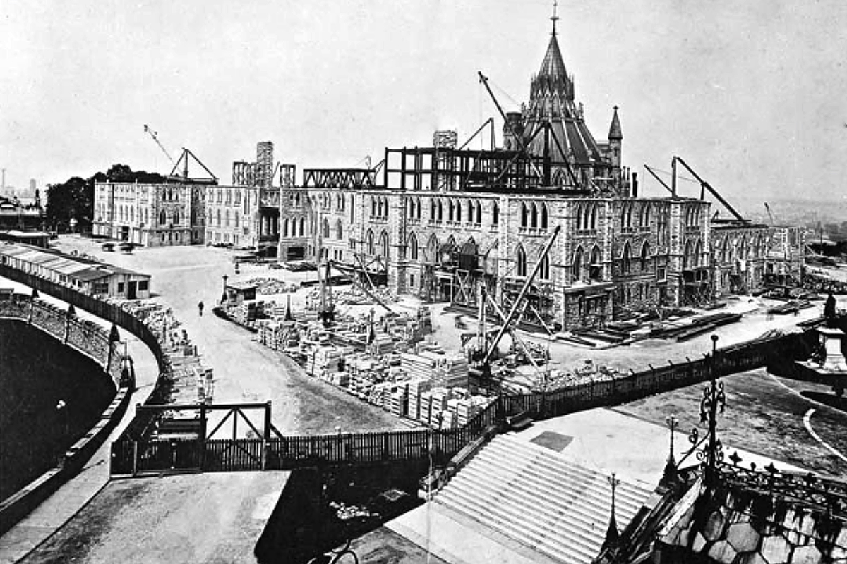 Reconstruction began in September 1916. By late 1917, construction had reached the fourth storey. (Photo credit: Library and Archives Canada)