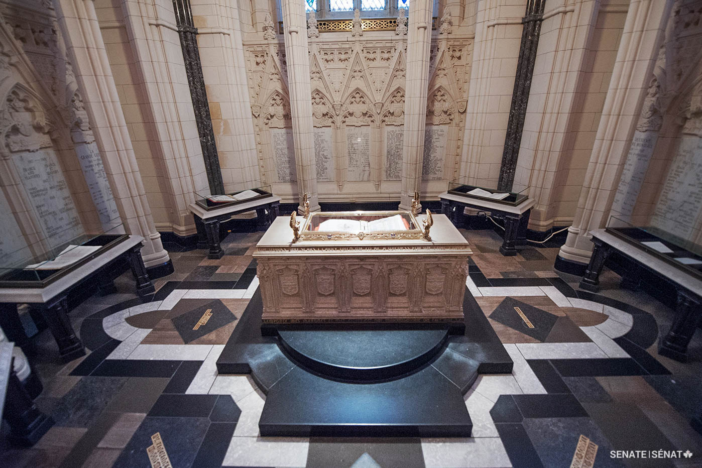 The limestone altar at the centre of the Memorial Chamber holds the First World War Book of Remembrance. The chamber’s floor is finished with flagstones from the battlefields of France and Belgium.