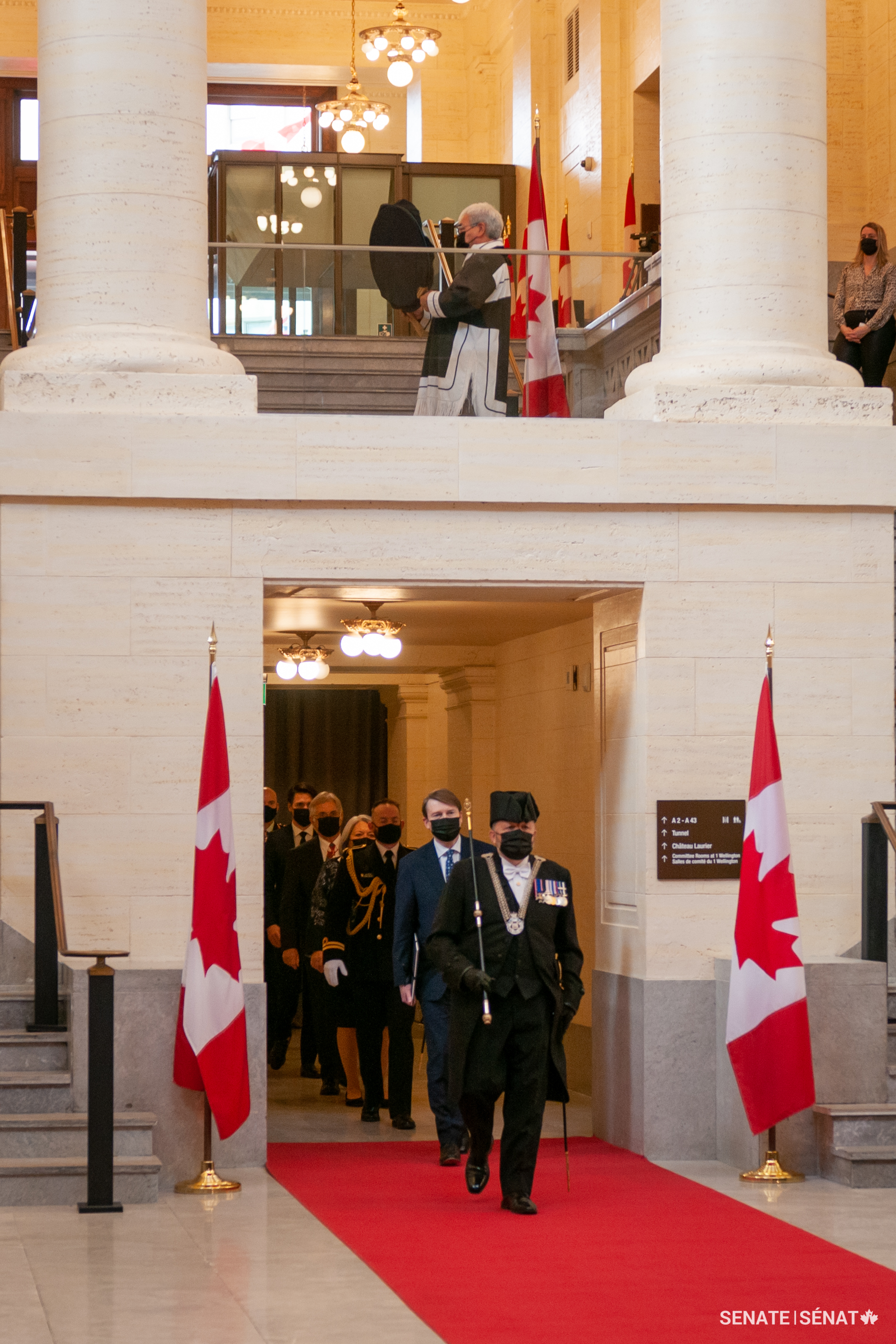 Usher of the Black Rod J. Greg Peters leads the procession of dignitaries into the Senate of Canada Building before the Speech from the Throne on Tuesday, November 23, 2021.