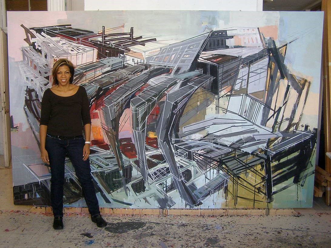 Trinidadian-Canadian painter Denyse Thomasos stands in front of her work Metropolis (2007). Ms. Thomasos passed away suddenly in 2012, at the age of 47. (Photo credit: The Estate of Denyse Thomasos and Olga Korper Gallery)