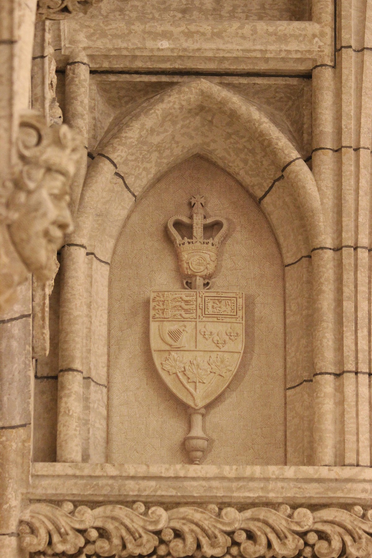 Mr. Smith worked with former Dominion Sculptor Phil White in 2011, carving this Senate emblem high up in Centre Block’s Hall of Honour. (Photo credit: John-Philippe Smith)