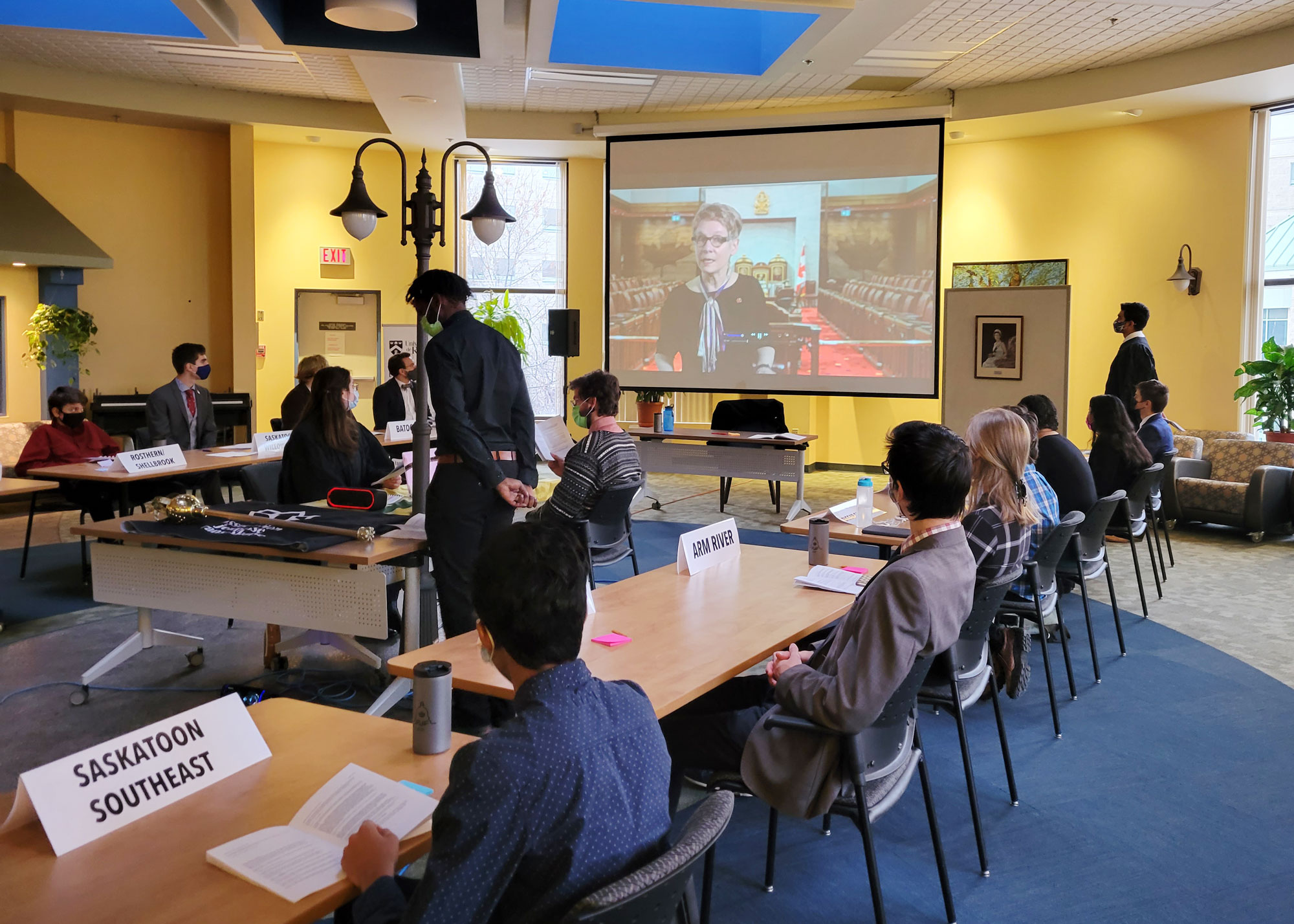 Sunday, December 5, 2021 – Senator Raymonde Gagné plays the role of lieutenant governor of Saskatchewan and delivers a Speech from the Throne during the opening ceremonies of the 26th edition of the Parlement jeunesse fransaskois in Regina, Saskatchewan.