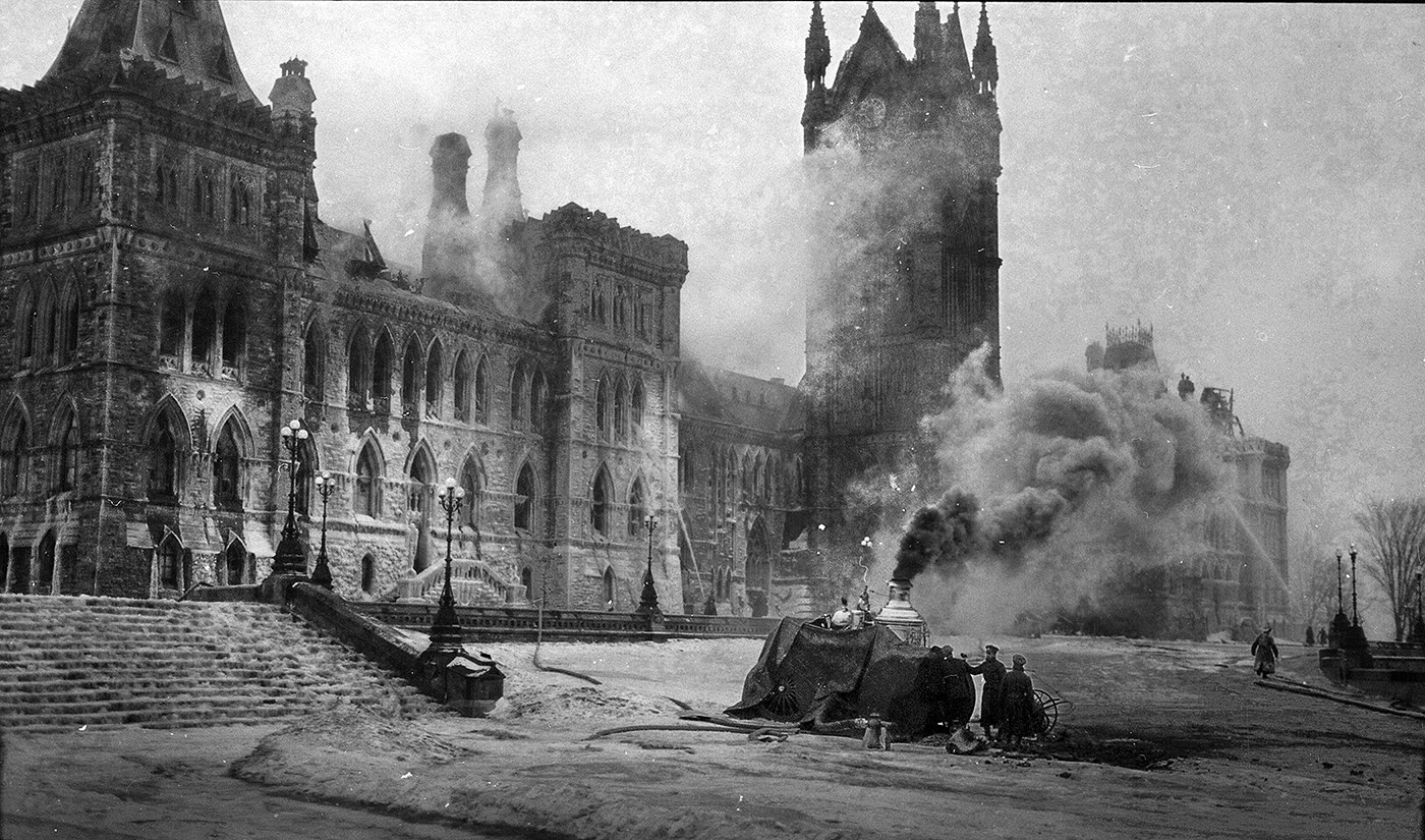 Steam-driven pumps drawing water from the Ottawa River and city water mains could barely contain the blaze that gutted the building on the night of February 3 and 4, 1916. (Photo credit: Library and Archives Canada)