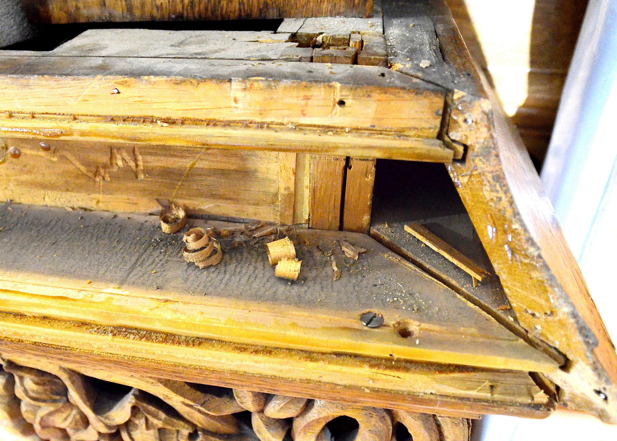 Dismantling the woodwork sometimes reveals little treasures from the past, including tightly wound wood shavings, known as “wood curls.”