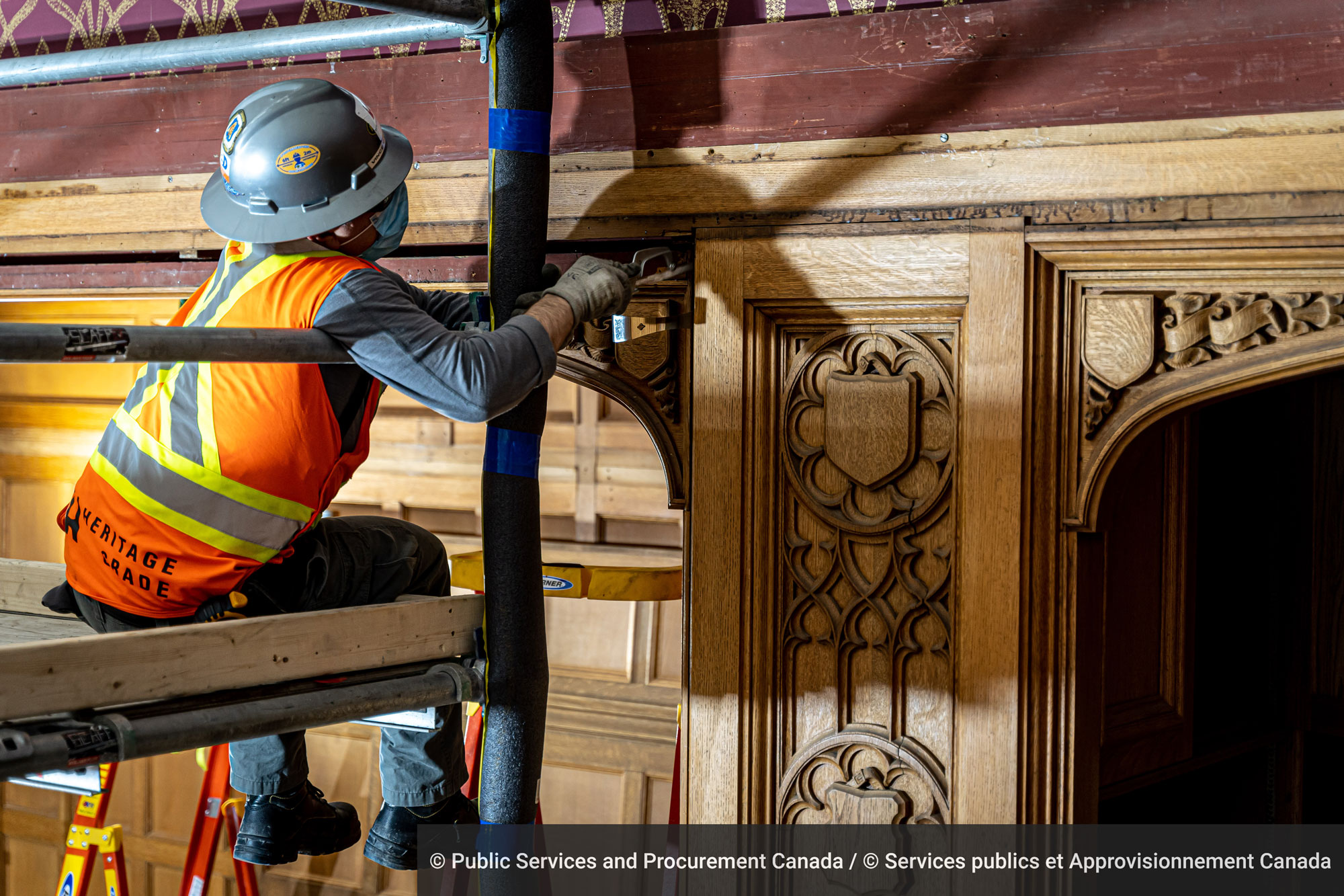 Workers take great care not to pull out the nails and screws holding the woodwork in place, because doing so could potentially damage the wood.
