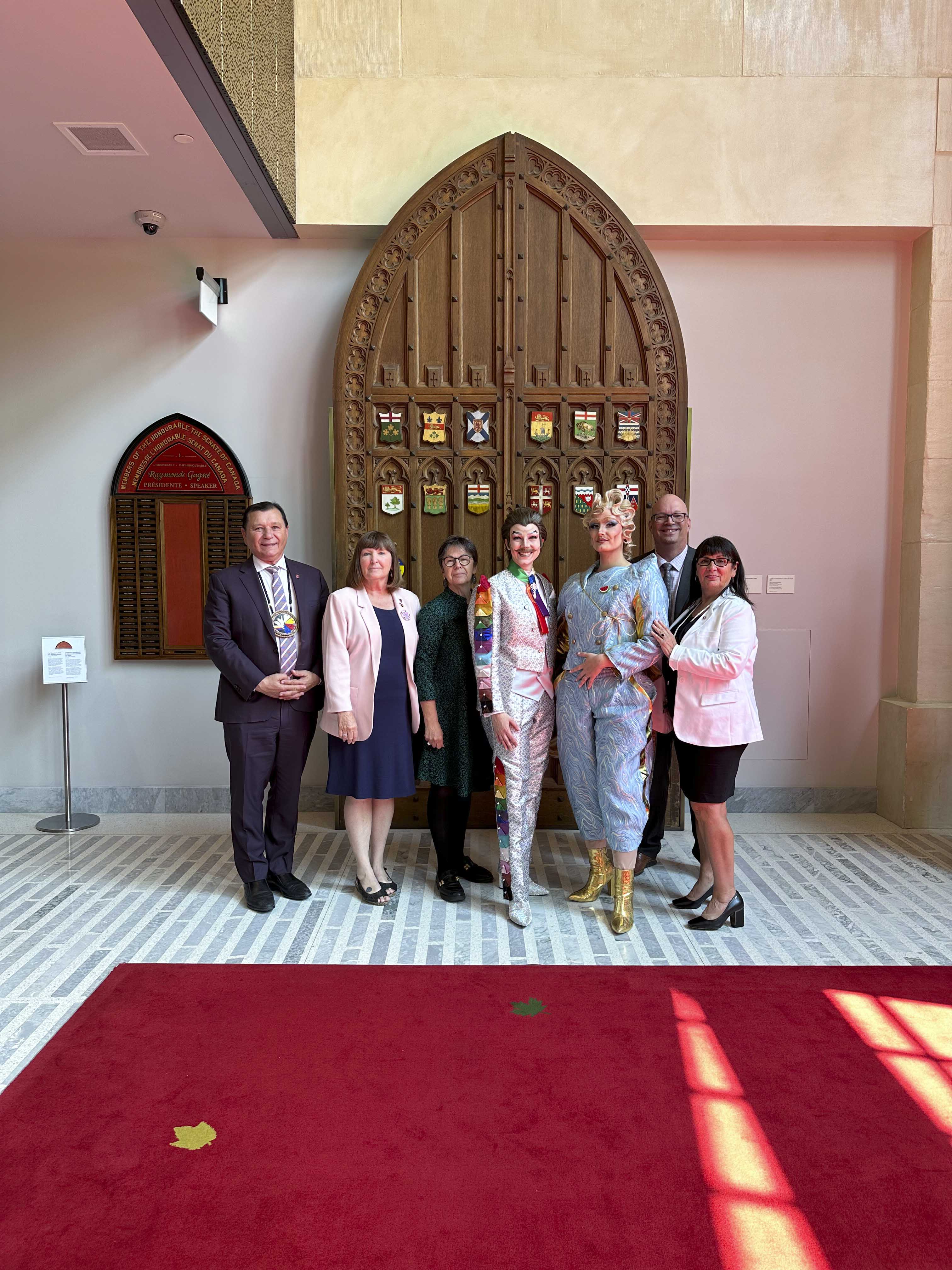 Wednesday, June 4, 2025 – From left to right: Senators Brian Francis, Mary Coyle, Kim Pate, Kristopher Wells, Jane MacAdam; visit of drag performers, Senate of Canada Building, Ottawa, Ontario.