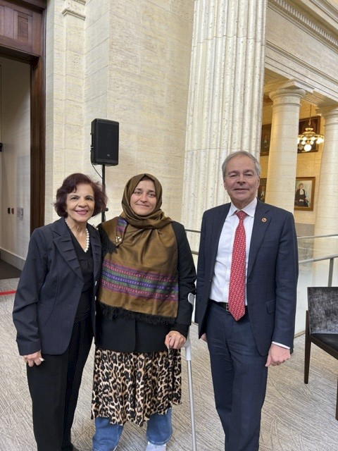 Thursday, December 1, 2022 – Senators Mobina S.B. Jaffer, left, and Pierre J. Dalphond, right, meet with Aurora Prize laureate Jamila Afghani, centre, at the Senate of Canada Building where she gave a moving speech on the humanitarian crisis in her country. She was congratulated by other senators, including Senate Speaker George J. Furey, for her award.