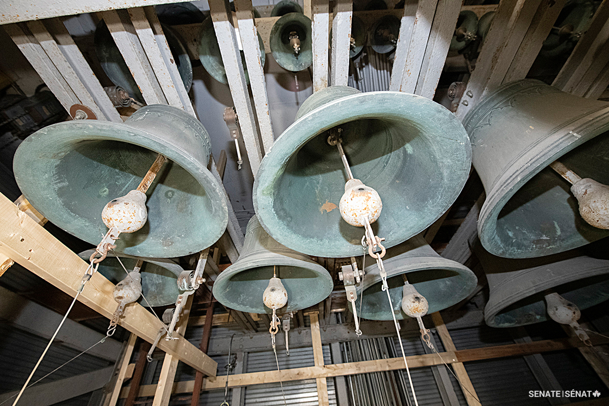 The Peace Tower carillon’s 53 bells range over seven stories. The instrument is played from a keyboard in a tiny room sandwiched between the smaller bells above and the largest bells below. Most of the carillon was disassembled in 2022; the bells and their clappers were shipped to the Royal Eijsbouts bell foundry in the Netherlands for restoration.
