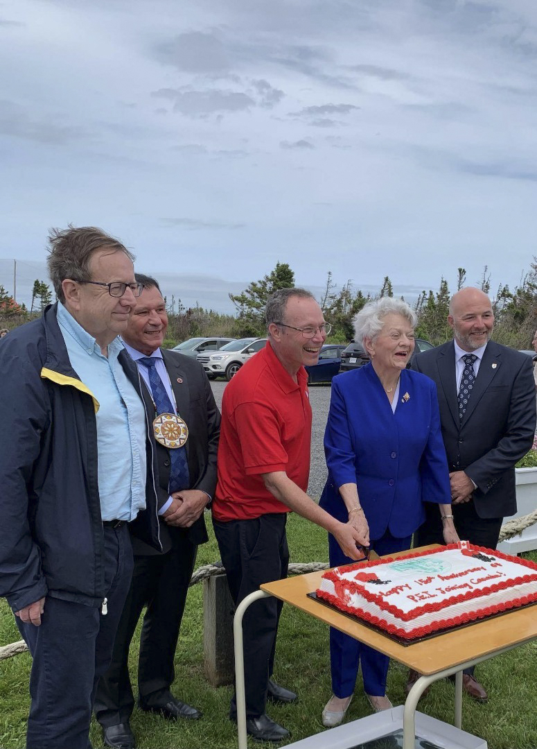 Tuesday, June 27, 2023 – Senators Percy E. Downe, left, and Brian Francis, second left, with the Honourable Antoinette Perry, Lieutenant Governor of Prince Edward Island, second right, and Member of the Legislative Assembly Robin Croucher, right; 150th Anniversary celebration of Prince Edward Island joining Confederation; Point Prim Lighthouse, Belfast, Prince Edward Island