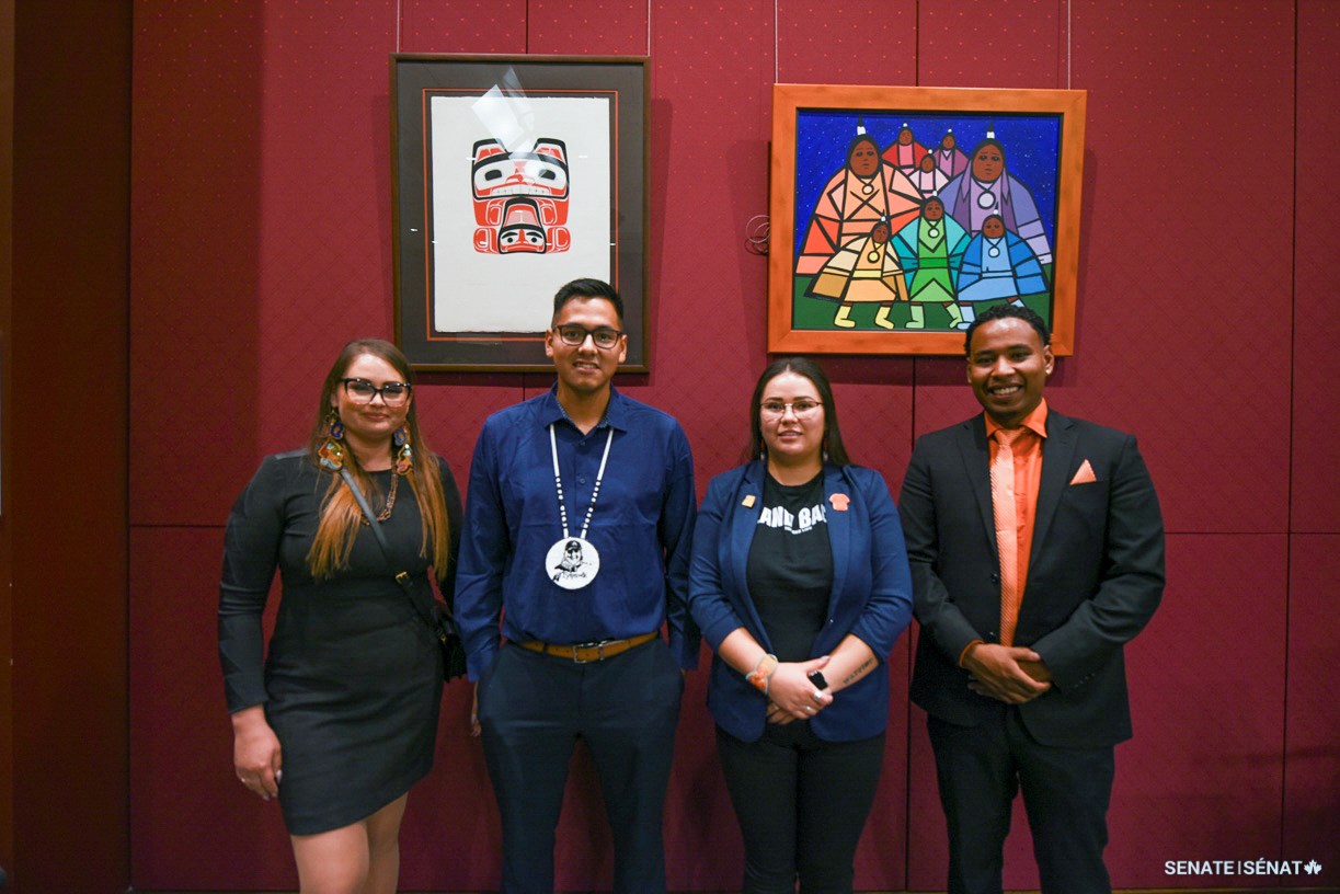 From left, Assembly of Seven Generations co-founder Gabrielle Fayant; Mawiw Council Inc. youth coordinator Tyrone Sock; British Columbia Assembly of First Nations youth representative Taylor Behn-Tsakoza; and Addiction Rehab Toronto counsellor Jama Maxie pose in the Senate of Canada Building during the Voices of Youth Indigenous Leaders event on September 26, 2022.