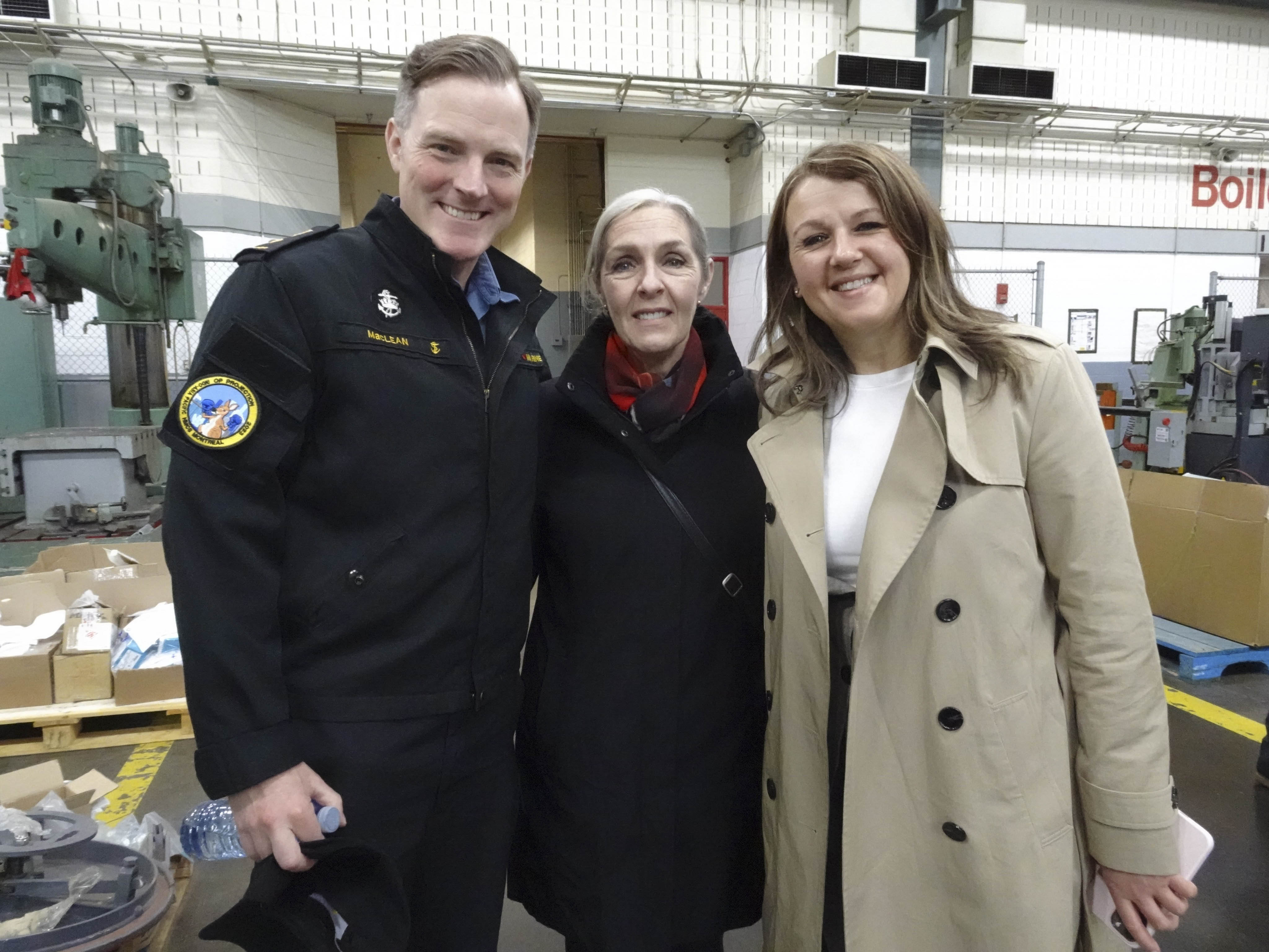 Wednesday, April 19, 2023 – Senator Rebecca Patterson, centre, visits the Canadian Forces Base in Halifax, Nova Scotia with a delegation from the NATO Parliamentary Assembly. The delegation visited multinational subcommittees on transatlantic defence and security co-operation. She is pictured with Commodore Trevor MacLean, Commander of Canadian Fleet Atlantic, left, and member of Parliament Julie Dzerowicz, right.