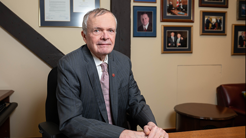 Senator Stephen Greene poses in his Senate office.