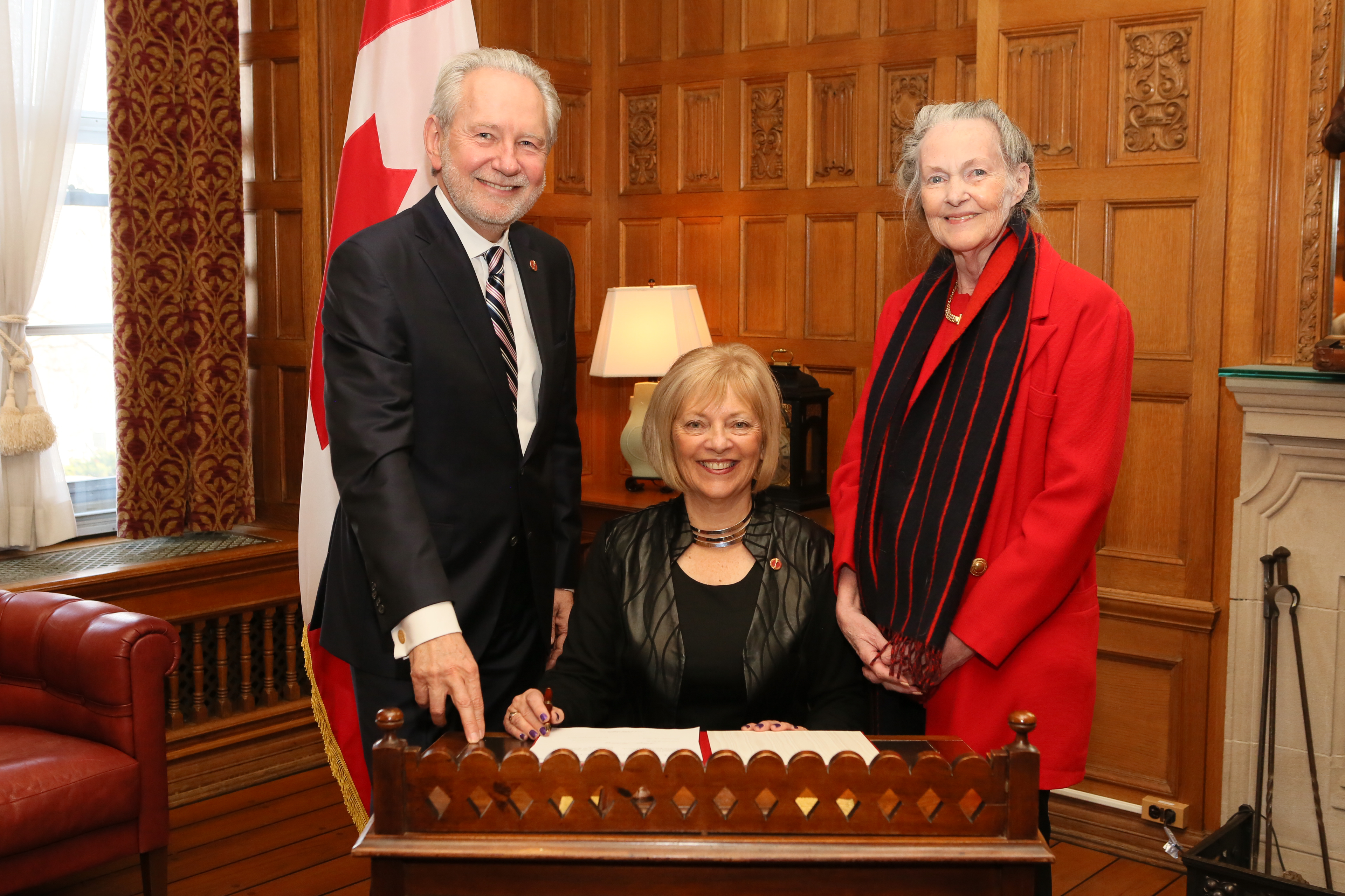 Senator Nancy J. Hartling on her swearing-in day at the Senate in November 2016 with senators Peter Harder and Elaine J. McCoy.