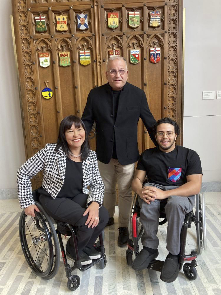 Tuesday, April 18, 2023 – Senator Chantal Petitclerc welcomes Défi sportif AlterGo Executive Director Maxime Gagnon, centre, and athlete-ambassador Saoud Messaoudi, right, to the Senate of Canada Building in Ottawa, Ontario. The senator made a statement in the Senate Chamber to celebrate the 40th edition of the Défi sportif AlterGo event, which brings together athletes of all abilities and is the largest annual multi-sport event in Canada.