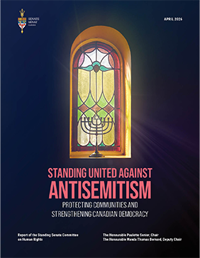 A stained-glass window with sunlight shining through, featuring a menorah with a Star of David at its centre, accompanied by the words: April 2026 Standing United Against Antisemitism: Protecting Communities and Strengthening Canadian Democracy Report of the Standing Senate Committee on Human Rights The Honourable Paulette Senior, Chair The Honourable Wanda Thomas Bernard, Deputy Chair