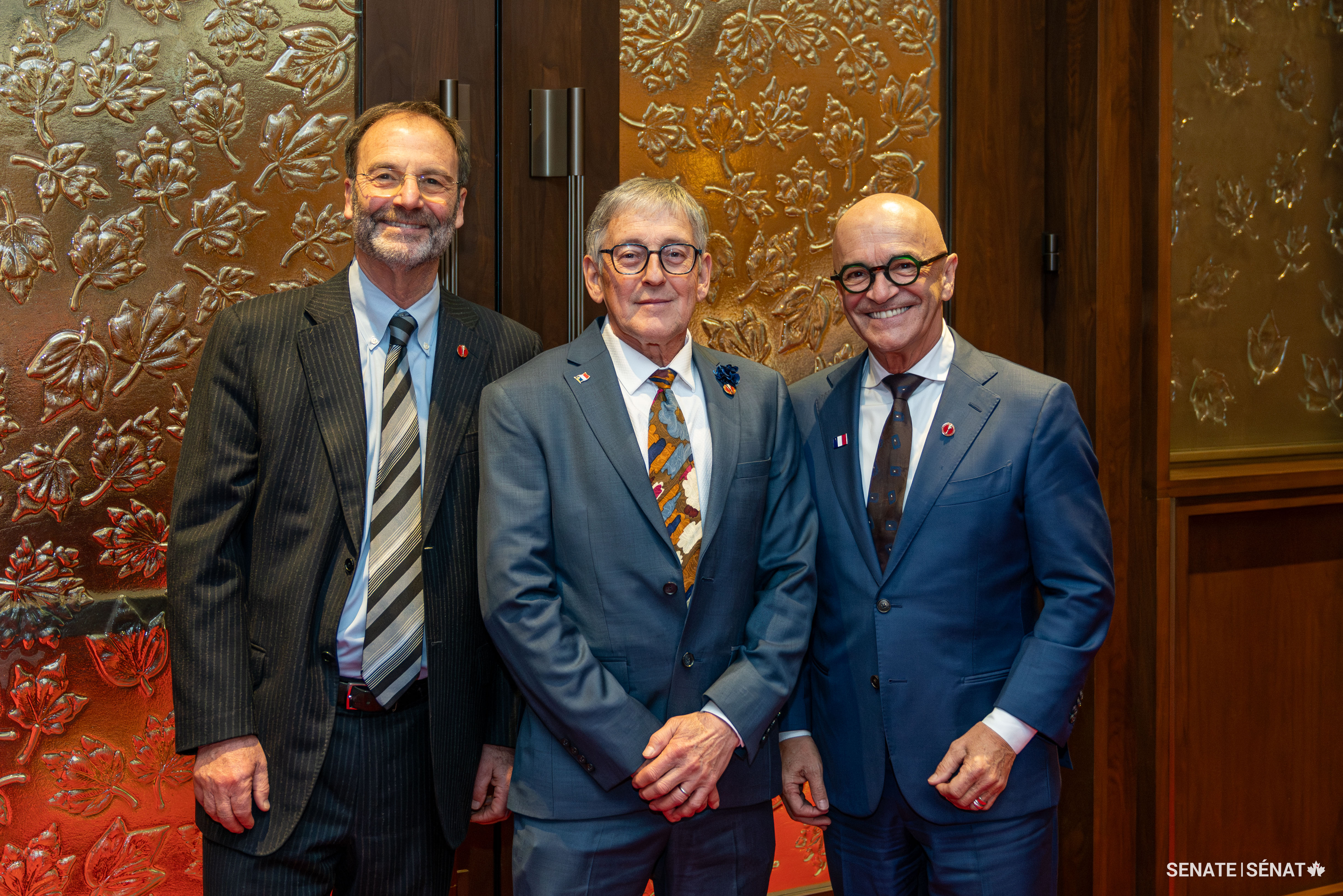 From left, Senator Marc Gold stands with senators Réjean Aucoin and René Cormier ahead of Senator Aucoin’s swearing-in ceremony on November 21, 2023.