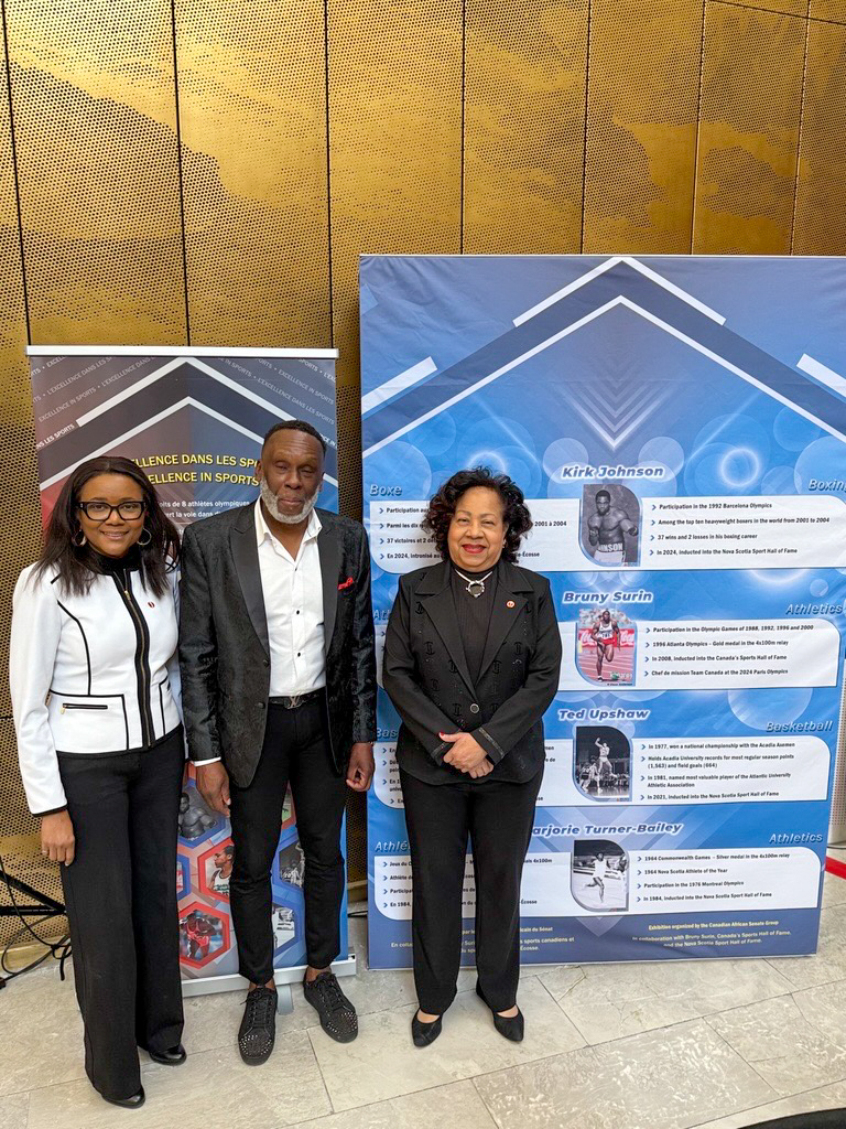 Friday, February 7, 2025 – Senators Suze Youance, left, and Marie-Françoise Mégie, right, with Bruny Surin, Team Canada’s Paris 2024 Chef de Mission;, Senate of Canada Building, Ottawa, Ontario.