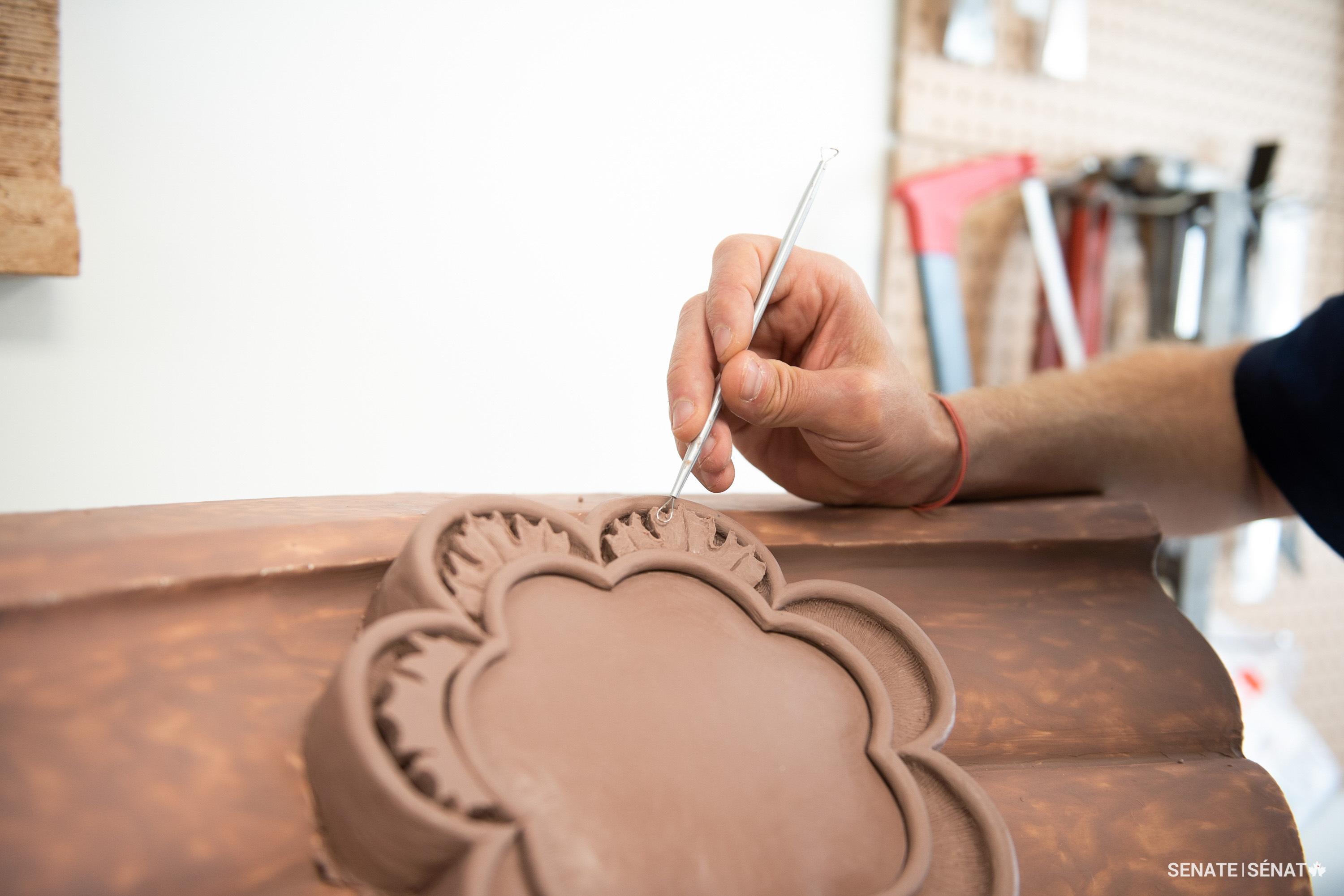 Mr. Smith works on the early stages of the model using a synthetic material called plasteline that, unlike traditional clay, does not dry out or shrink.