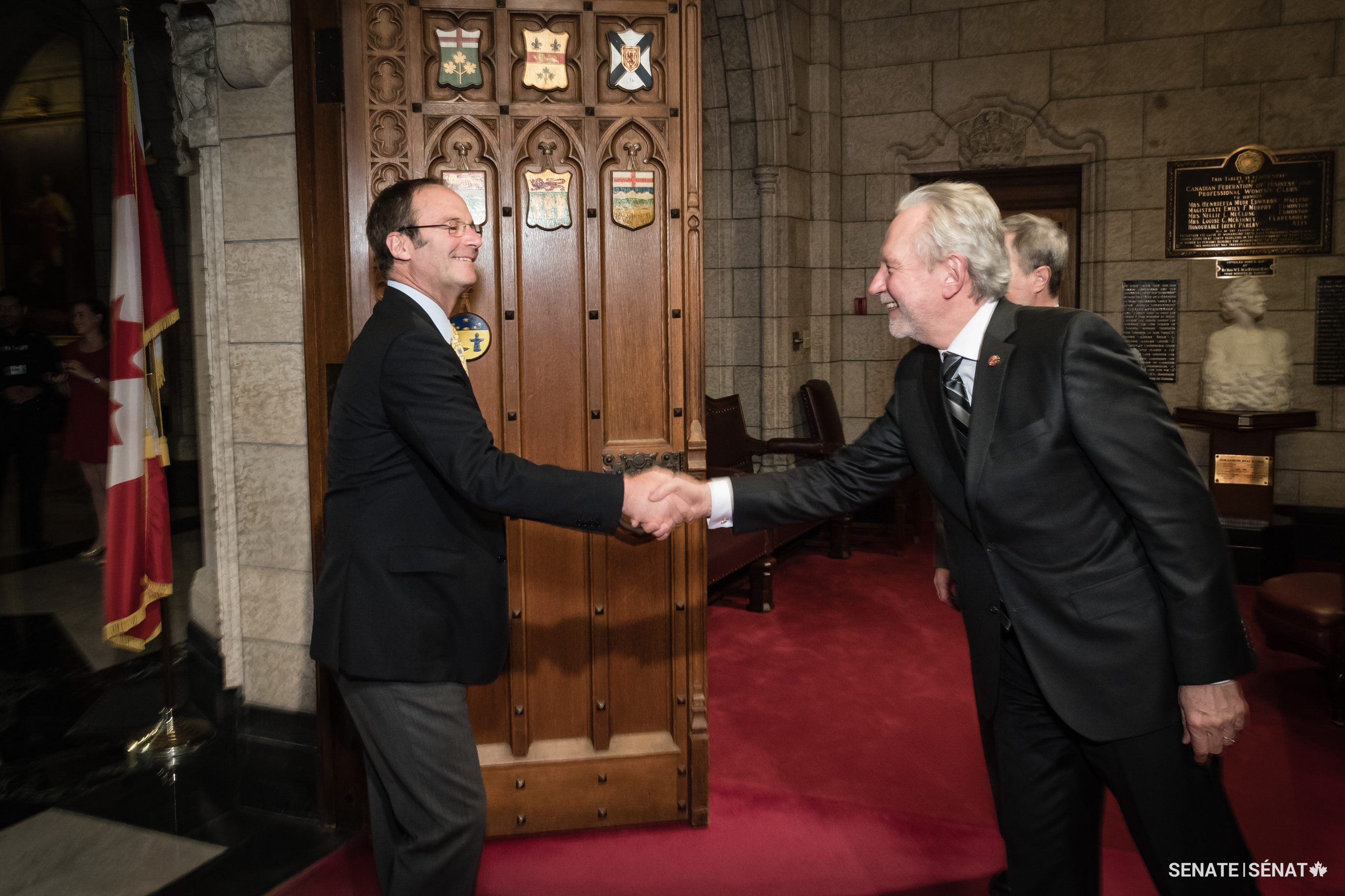 The day of his swearing-in ceremony in Centre Block, Senator Gold, left, shakes hands with Senator Peter Harder, whom he eventually succeeded as Government Representative in the Senate in 2020.