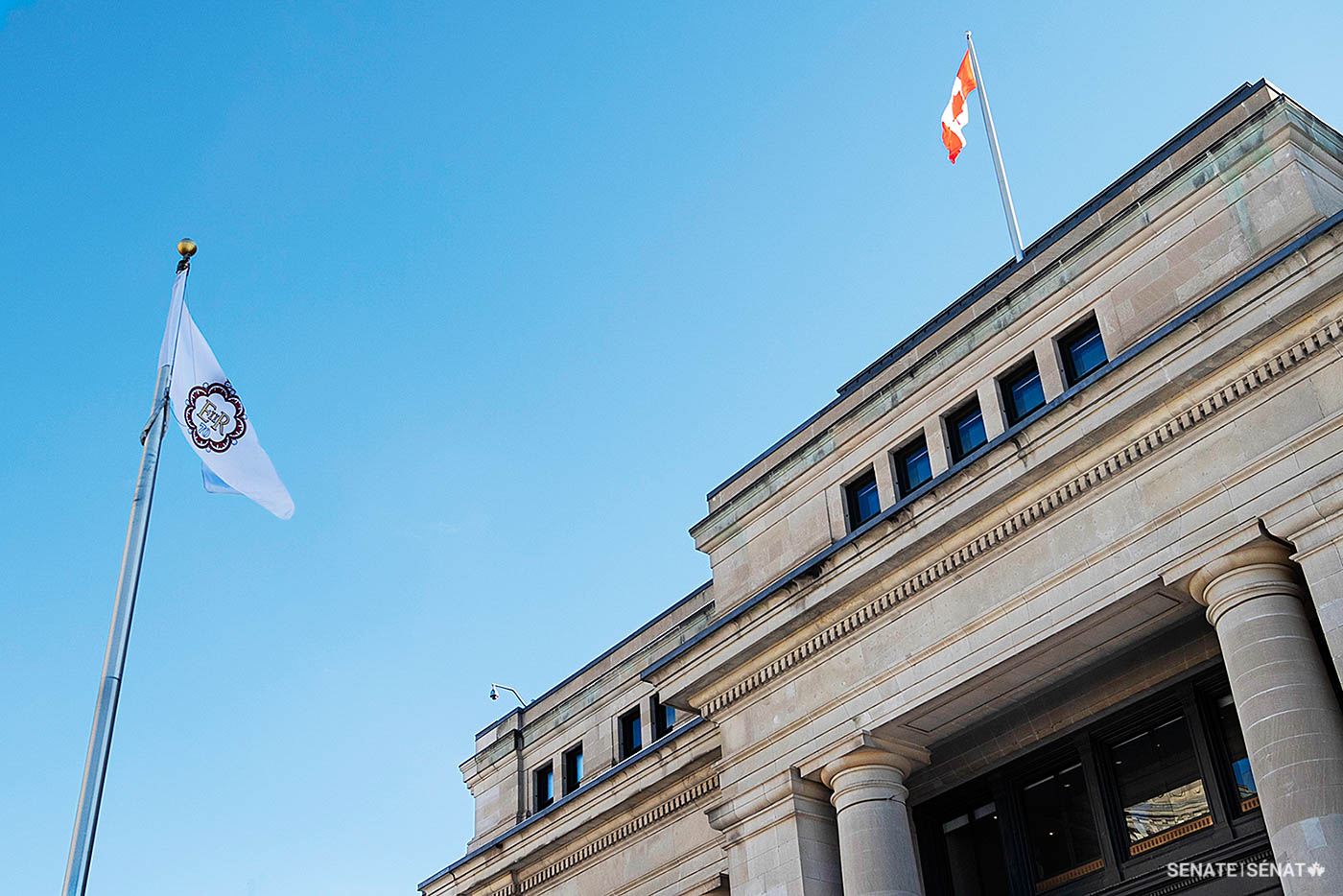The Canadian Platinum Jubilee emblem is flown from the Senate of Canada Building’s ceremonial flagpole.