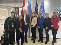 Senators Marilou McPhedran, Andrew Cardozo, Ratna Omidvar, the Ambassador and Permanent Representative of Canada to the United Nations in New York Bob Rae, and senators Krista Ross, Kim Pate, Iris G. Petten and Donna Dasko standing together for a photo.