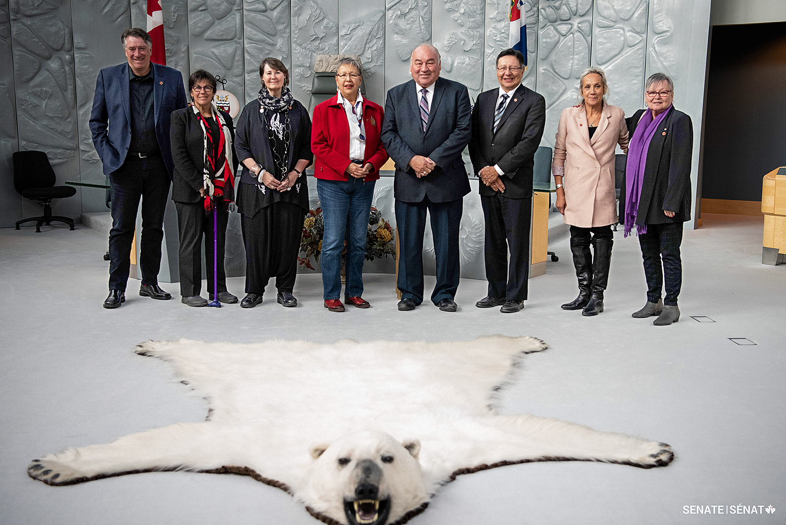 Senator Tannas, left, with members of the Senate Committee on Indigenous Peoples during a fact-finding mission through the Western Arctic to study a new relationship between Canada and Indigenous peoples in 2018. Also pictured, from left, are senators Kim Pate and Marilou McPhedran, former senator Lillian Eva Dyck, former Northwest Territories premier Bob McLeod, former senator Dan Christmas, Senator Mary Jane McCallum and former senator Sandra Lovelace Nicholas.