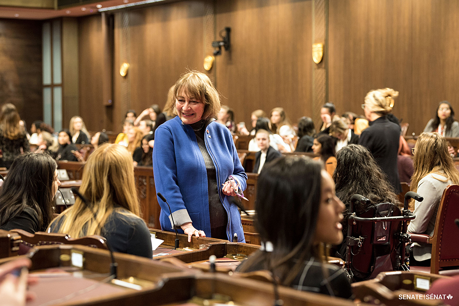 Senator Dasko welcomes delegates to the Senate Chamber in 2019 for Daughters of the Vote, a program that invited one young woman from each federal riding to Ottawa to participate in debates in the Senate and House of Commons.