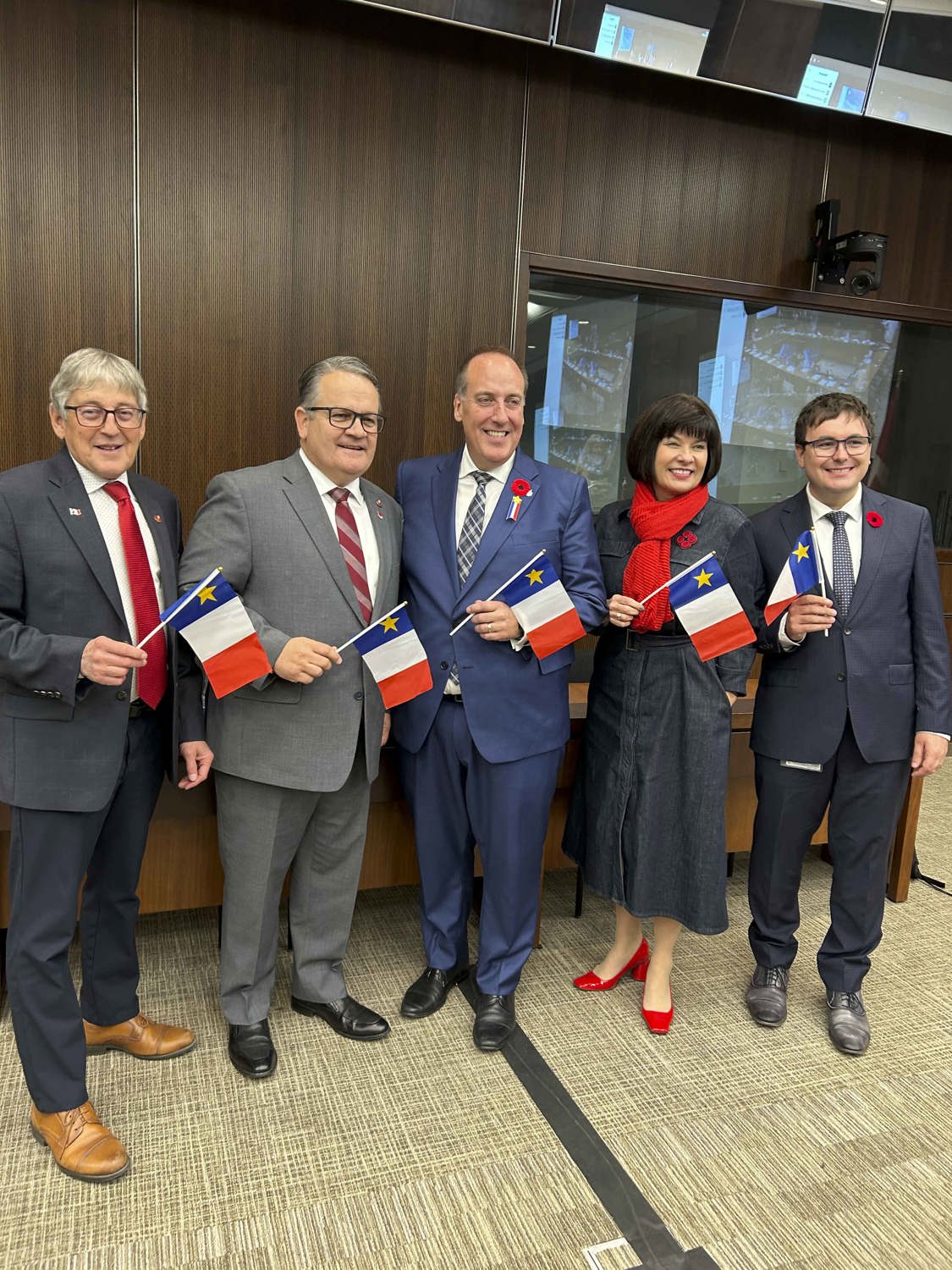 Wednesday, November 5, 2025 – From left, senators Réjean Aucoin and Victor Boudreau with Members of Parliament Chris d’Entremont, Ginette Petitpas-Taylor and Guillaume Deschênes-Thériault; formation of the Acadian Association of Parliamentarians of Canada; Parliament Hill, Ottawa, Ontario.