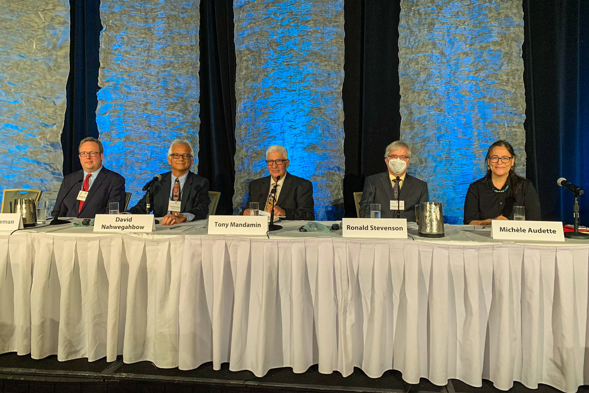 Tuesday, June 28, 2022 – Senator Michèle Audette (far right) participates in a panel moderated by Federal Court Justice Paul Favel (not pictured) on Indigenous peoples and the Federal Court. The panel was part of the Federal Court of Appeal and Federal Court 50th Anniversary Symposium in Ottawa, Ontario. The other panellists were (from left to right) Dwight Newman, David Nahwegahbow, Leonard S. (Tony) Mandamin, Ronald Stevenson and Aimée Craft (not pictured).