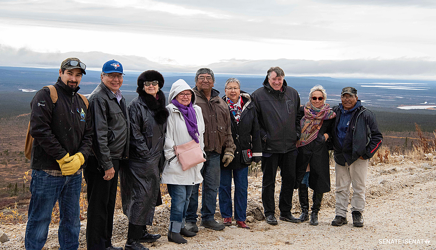 Senator McCallum, second from right, joined the Senate Committee on Indigenous Peoples for a fact-finding mission to northern and western Indigenous communities in 2018. They are pictured here alongside community members from Old Crow, Yukon.