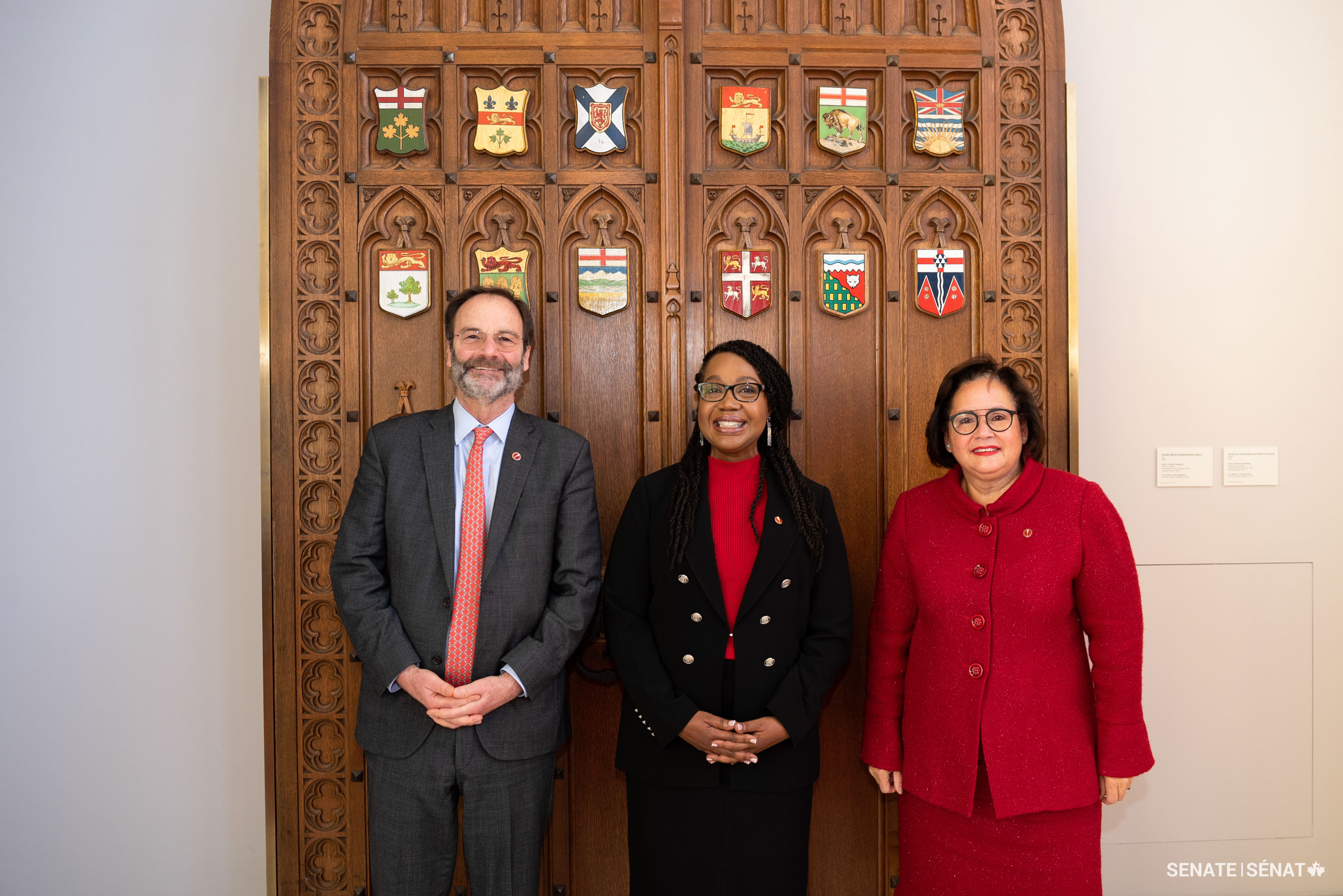 Senator Sharon Burey poses with senators Marc Gold and Rosemary Moodie ahead of her swearing-in ceremony on December 13, 2022.